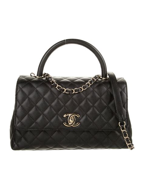 chanel small coco handle handbag|Chanel coco handbag price uk.